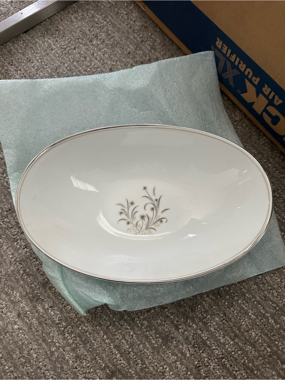 Noritake White Porcelain Serving Bowl with Silver Trim and Floral Accent